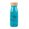 Petit Boum Botella sensorial float azul turquesa