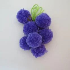 Button Bag Maletín crea con pompones